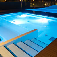 Stairs,In,A,Small,Swimming,Pool,At,Night